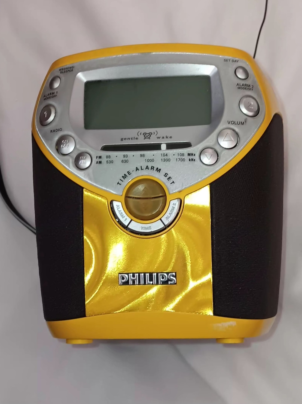 Philips Yellow and Black Portable Clock Radio with Silver Control Panel